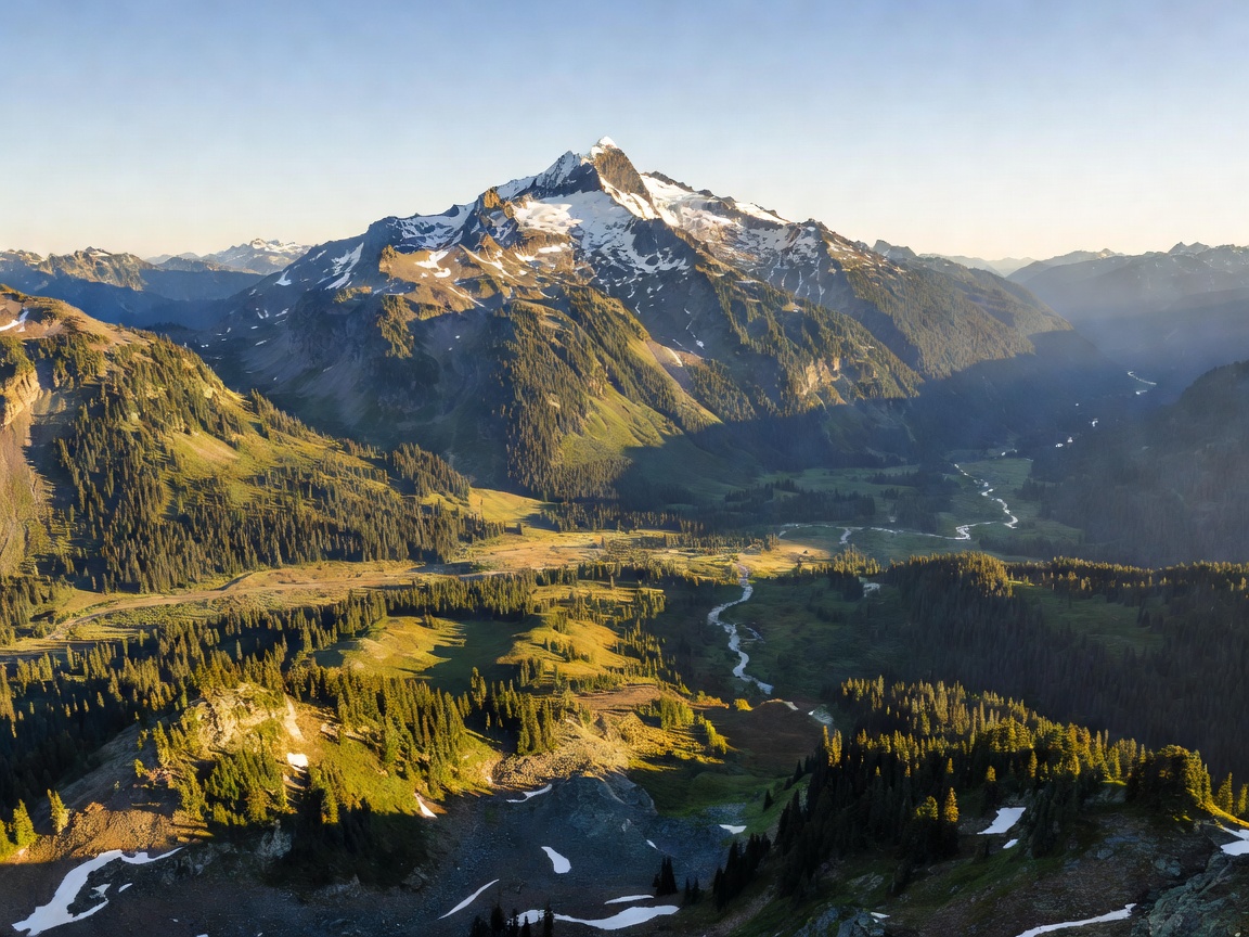 Whistler mountain peak overview and expansive valley